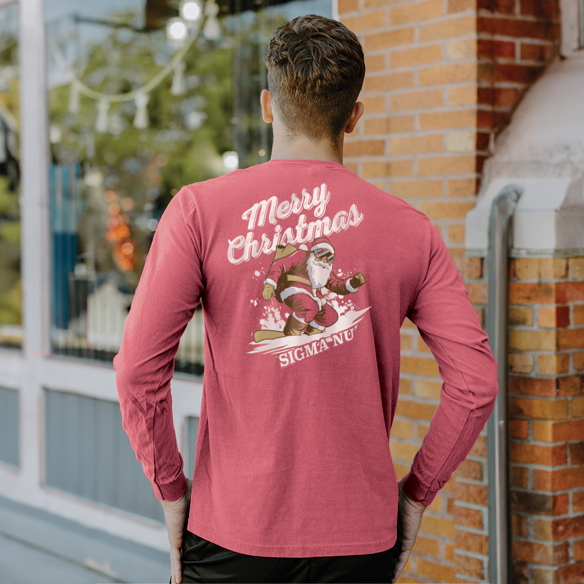 New! Sigma Nu Holiday Shredding Santa Long Sleeve Tee